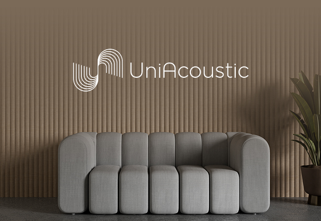 UniVicoustic fluted acoustic wall panels behind a modular sofa