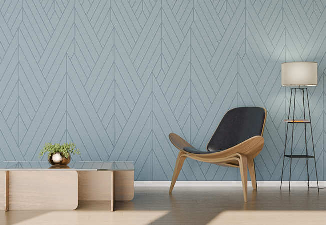 Acoustic wall panels with a chevron pattern in a living space, by UniVicoustic